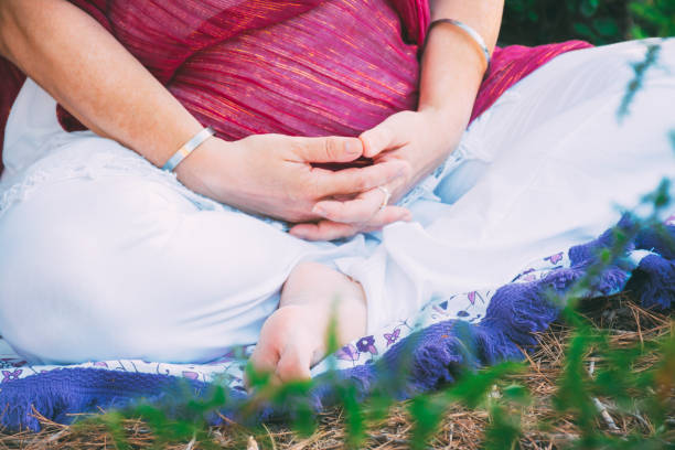 istock Woman meditating in the nature 1279020026
