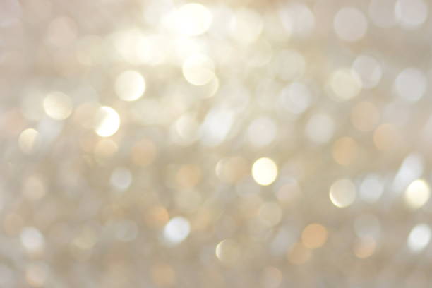 istock blur glitter, bokeh, defocused gold festive background,  texture. Xmas abstract backdrop neutral color . 1279021447