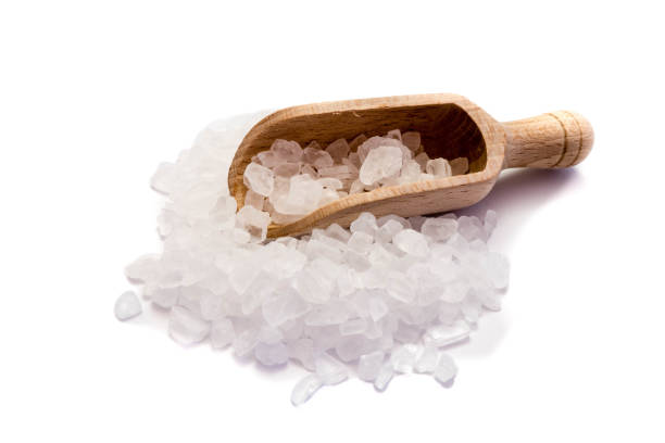 istock Sea salt isolated on white background 1279028677