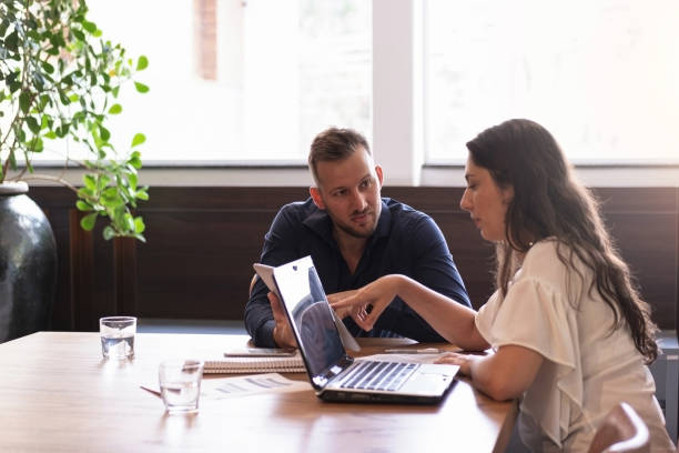 istock Man and woman in a office. 1279028857