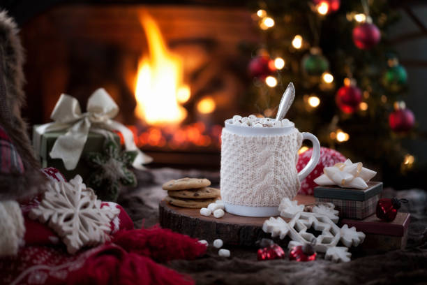 istock Christmas cozy hot chocolate in front of the fireplace 1279030121