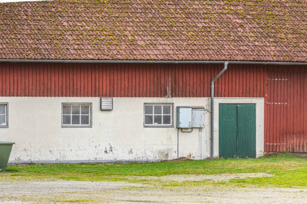 Traditional fisherman's house in Nida, Lithuania. Nida is a resort town in Lithuania. Located on the Curonian Spit between the Curonian Lagoon and the Baltic Sea.