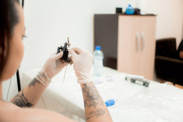 Tattoo artist getting ready to tattoo.