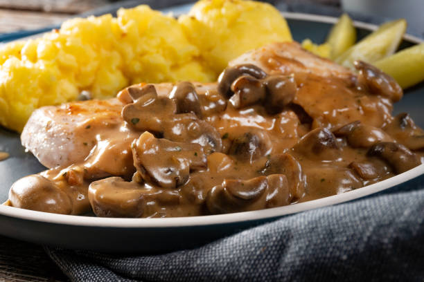 istock Grilled chicken breast with mushroom sauce. 1279038422