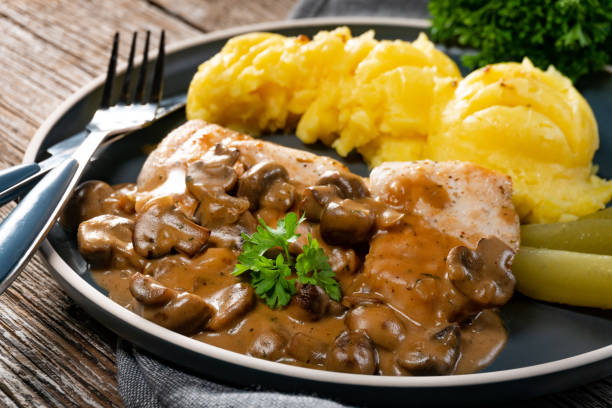 istock Grilled chicken breast with mushroom sauce. 1279039002