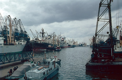 Bremerhaven, Bremen, 1965. Cargo ships unload their freight.