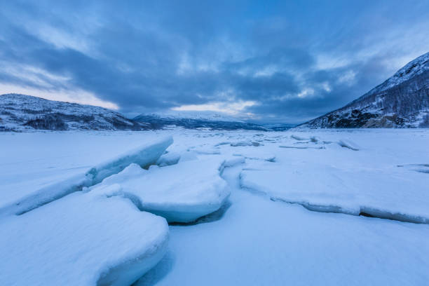 istock Winter landscape with ice on foreground, Norway 1279040199