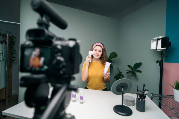 istock Latin vlogger recording herself with camera 1279047829