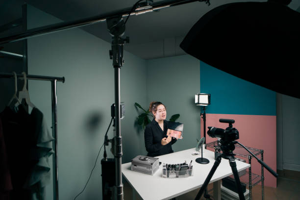 istock Young female vlogger presenting makeup to camera 1279047950
