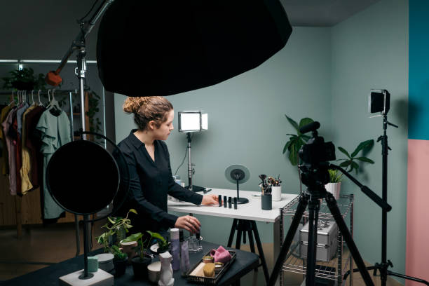 istock A latin female vlogger putting cosmectis on table and light 1279047963