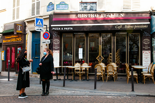 Place de la Contrescarpe : Charming parisian cafe, outdoor tables without people, during pandemic coronavirus in Paris. France . October 7, 2020