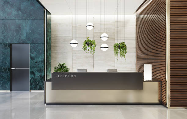 Modern Offices lobby interior area with elevators and stairs and with long reception desk Modern and luxurious Offices lobby interior area with elevators and stairs. Long reception desk.
green marble wall tiles decoration. 3d rendering receptionist stock pictures, royalty-free photos & images