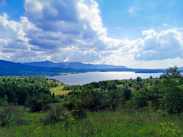 Sun, clouds, lake and the nature