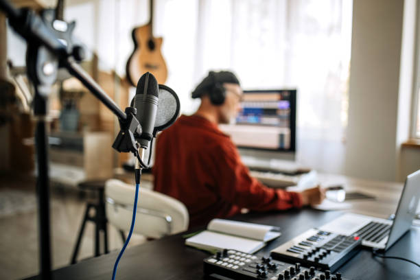 istock Senior musician working in his home music studio 1279050368