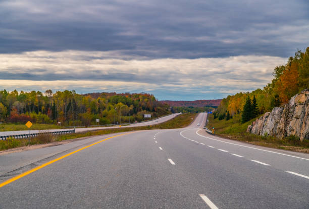 Divided Highway in Autumn Landscape - Highway 11 in Northern Ontario, Canada