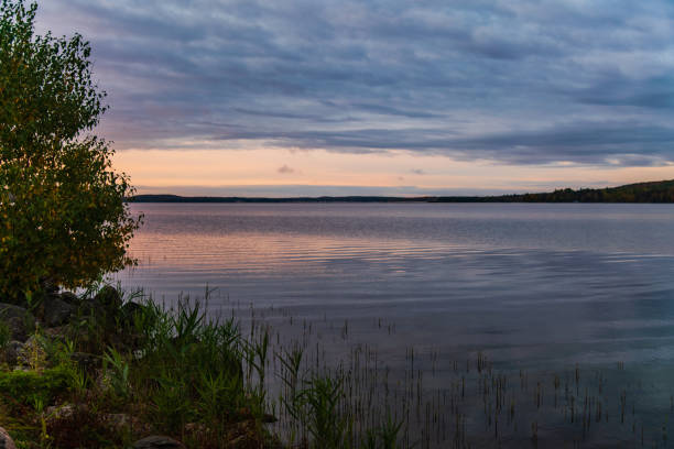 istock Sunrise over a Lake 1279053001