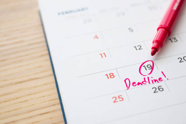 istock Deadline write on white calendar page date close up 1279059047
