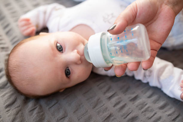 istock Mother Is Feeding Her Child 1279059533