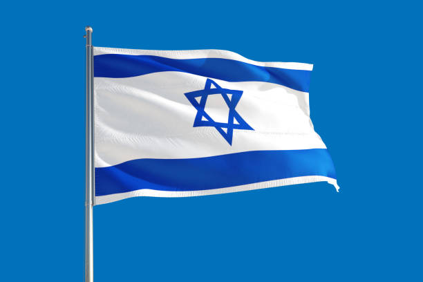 Israel national flag waving in the wind on a deep blue sky. High quality fabric. International relations concept. Israel national flag waving in the wind on a deep blue sky. High quality fabric. International relations concept. israeli flag photos stock pictures, royalty-free photos & images