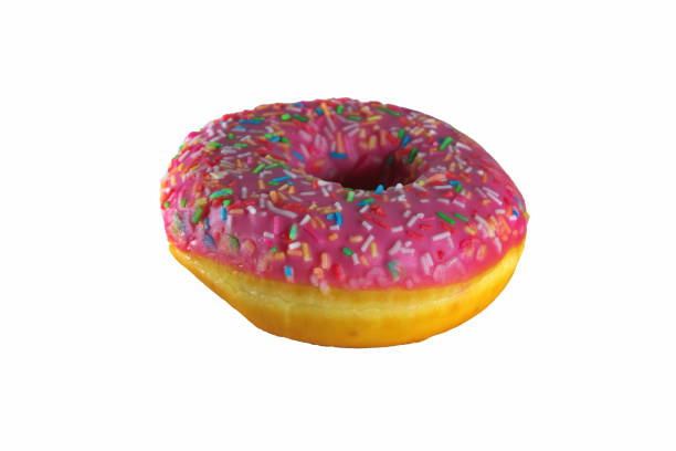 istock Donut with sprinkles isolated on white background top view. 1279063921