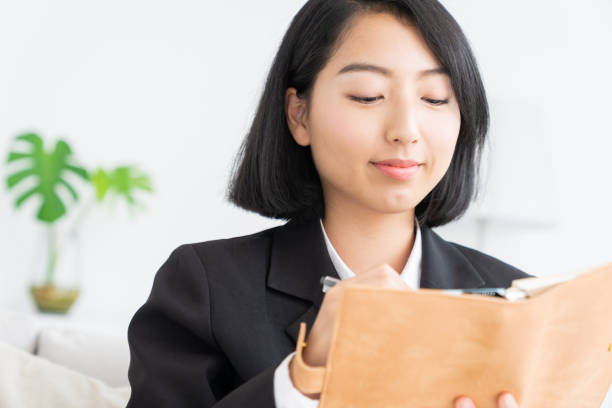 istock asian women ,schedule book 1279065200