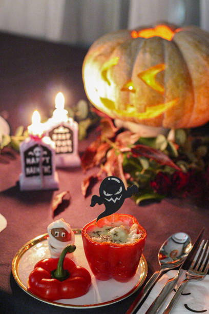 Halloween table with jack o lantern and finger food