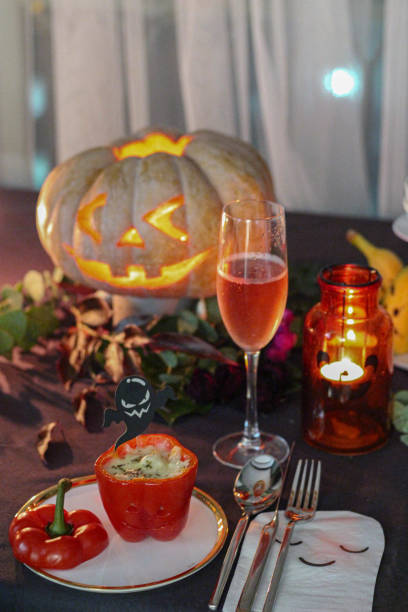 istock Halloween table with jack o lantern and finger food 1279069358