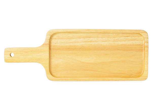 istock Wooden bread cutting board isolated with path on white background. 1279070444
