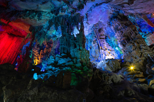 Guilin,China - Aug.19,2020: Many tourists are visiting Reed Flute Cave, which is Guilin's most spectacular caves. It is a brilliant Karst cave.