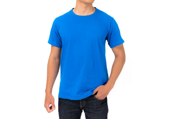 T-shirt design, Young man in blue t-shirt stock photo