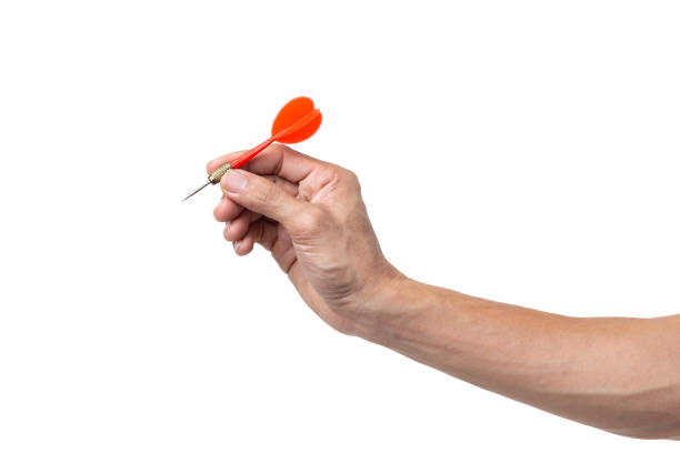 istock Hand man holding arrow directed towards dart board target,isolated on white background with clipping path 1279080764