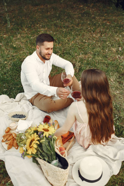 istock Beautiful couple spend time on a summer field 1279081070
