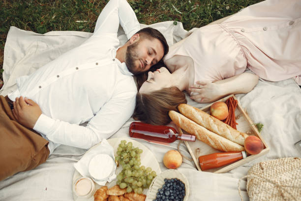 istock Beautiful couple spend time on a summer field 1279081596