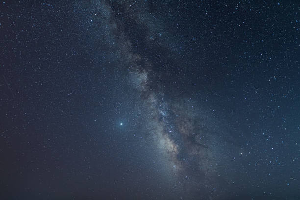 istock Milky way galaxy with stars and space dust in the universe. 1279081852