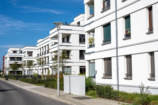 Modern white townhouses in a development area in Berlin, Germany