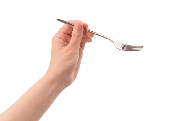 istock Fork in woman hand isolated on white. 1279082441