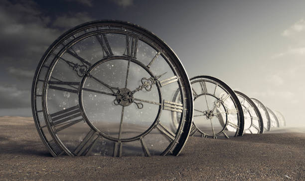 Antique Glass Clocks In The Desert A line of half buried antique clocks with a glass backing in a sandy desert landscape - 3D render surreal stock pictures, royalty-free photos & images