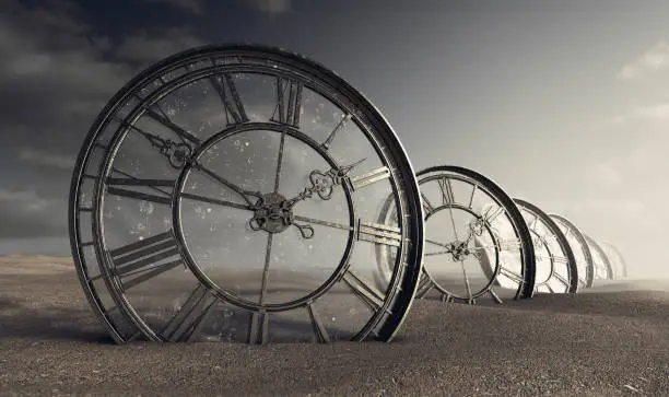A line of half buried antique clocks with a glass backing in a sandy desert landscape - 3D render