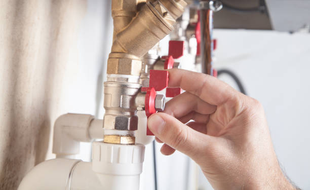 istock Male hand opens or closes the gas valve. 1279083675