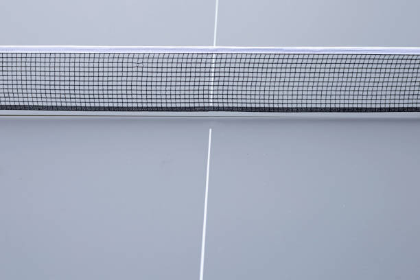 istock Net of table tennis ping pong on grey background 1279083782