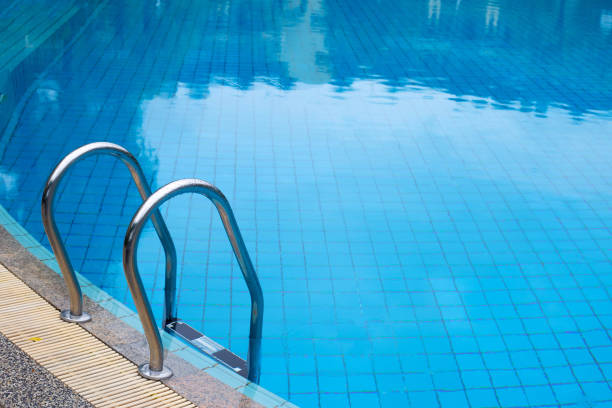 istock Outdoor swimming pool with stair 1279084373