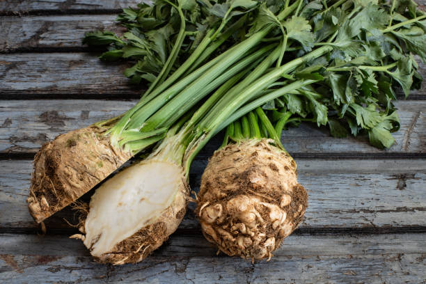 Close-up picture of celery root. Celery concept on the wooden rustic table. Celeriac stock pictures, royalty-free photos & images