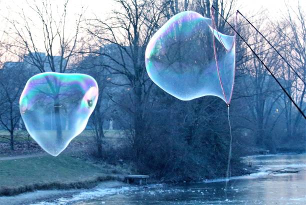istock a giant bubble floating free in the open and another that is forming 1279085497