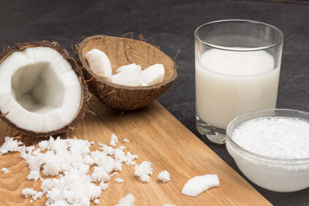 istock Coconut milk in glass and bowl. 1279091232