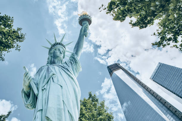 istock Statue of Liberty and Freedom Tower 1279092724