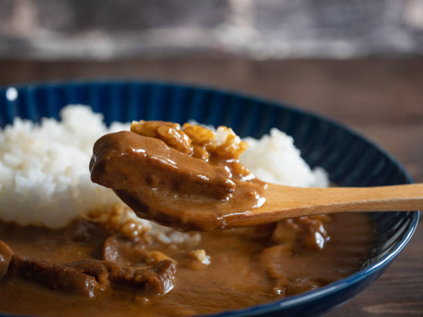 Close-up of a spoon with beef curry rice. Close-up of a spoon with beef curry rice. curry stock pictures, royalty-free photos & images