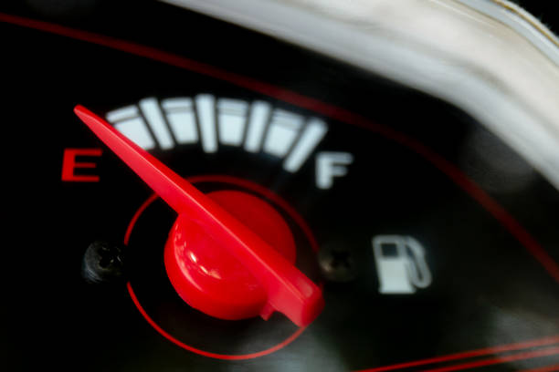 istock fuel gauge with arrow red indicator level (selective focus) 1279102658