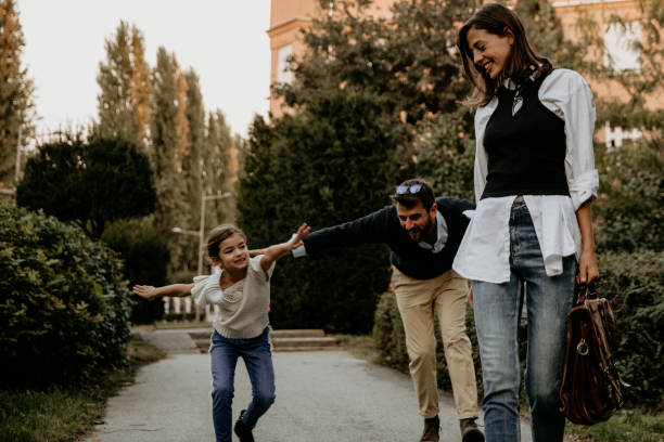 istock Daddy, we are flying around mommy 1279107897