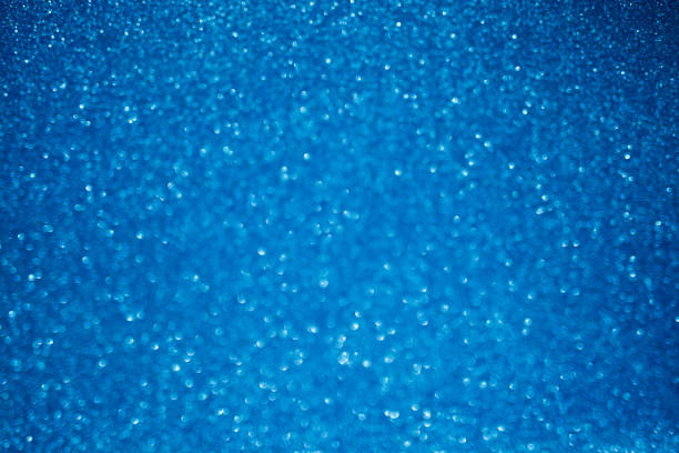 istock blue glitter texture christmas abstract background with bokeh 1279114464