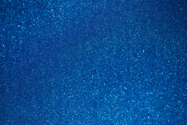 istock blue glitter texture christmas abstract background with bokeh 1279114763